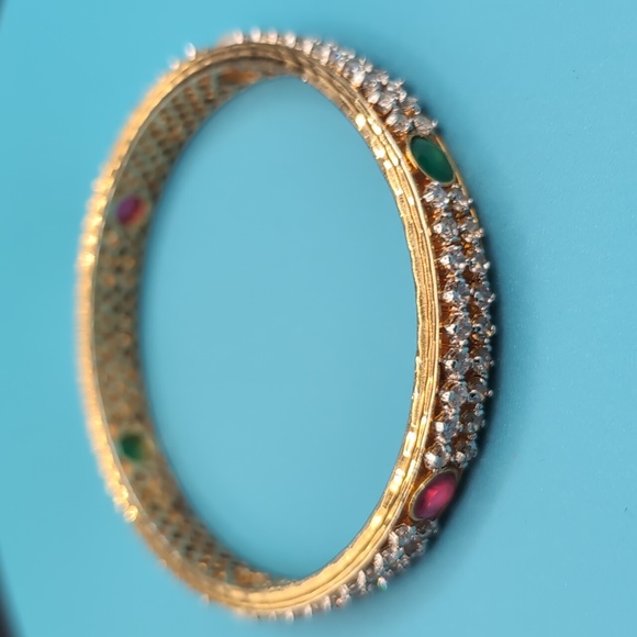 Gold Toned Textured Pattern Bracelet With Rubies And Coloured Faceted Stones - Picture 6 of 10
